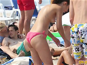steaming big mammories topless fledgling teens bikini Beach hidden cam